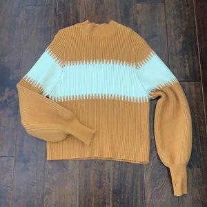 Mock neck sweater with balloon sleeves , tight cuffs